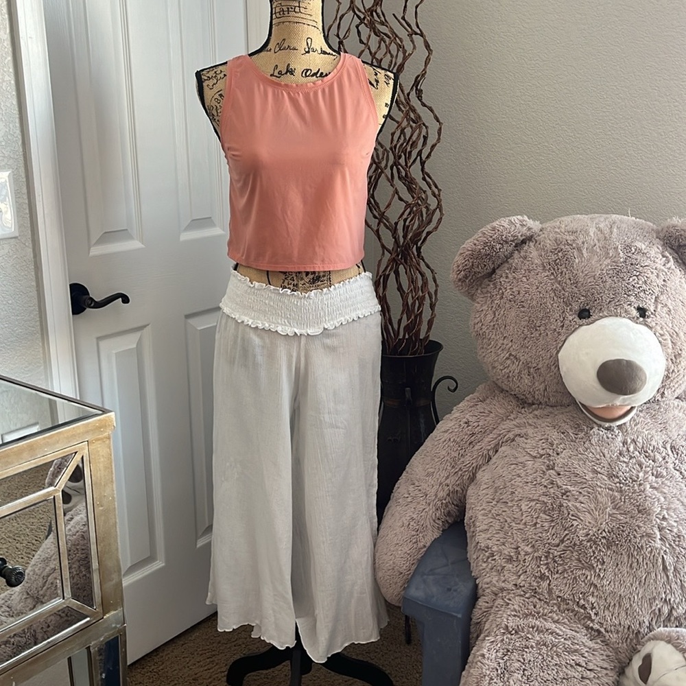 Top and pants suit. no brand on Tip size S/M 
Pants Castaway size M 
Color